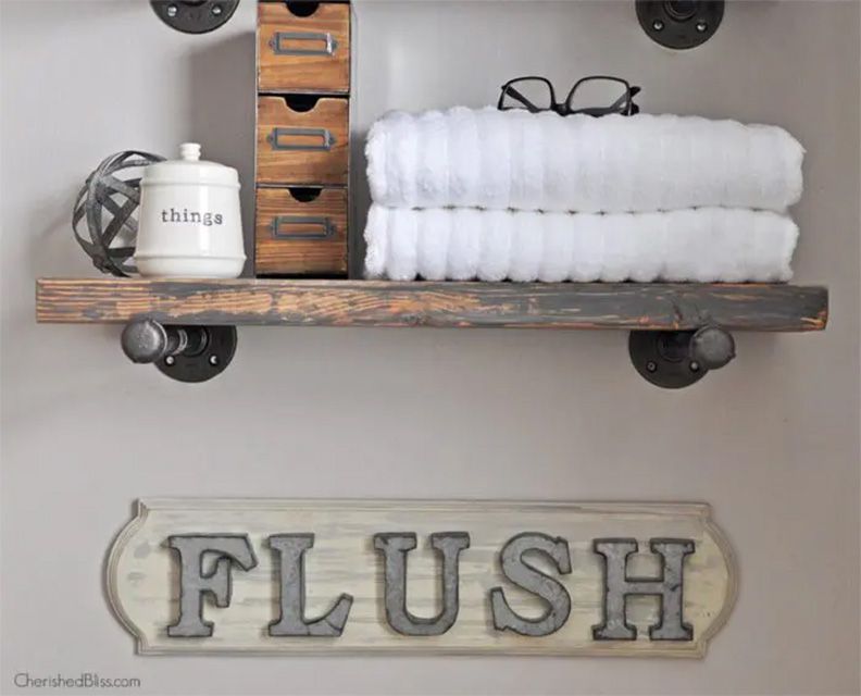 A farmhouse style "Flush" wooden sign