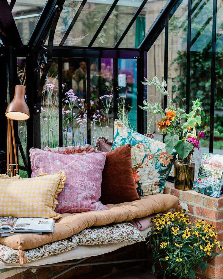 boho decorated reading nook with flowers